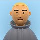 Melbet avatar of a boy with blond hair and a gray hoodie